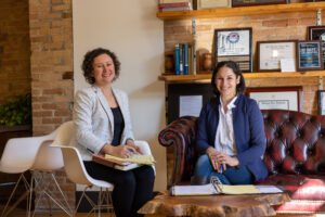 Michigan Medical Malpractice Lawyers, Hoffer & Sheremet, sitting on a couch